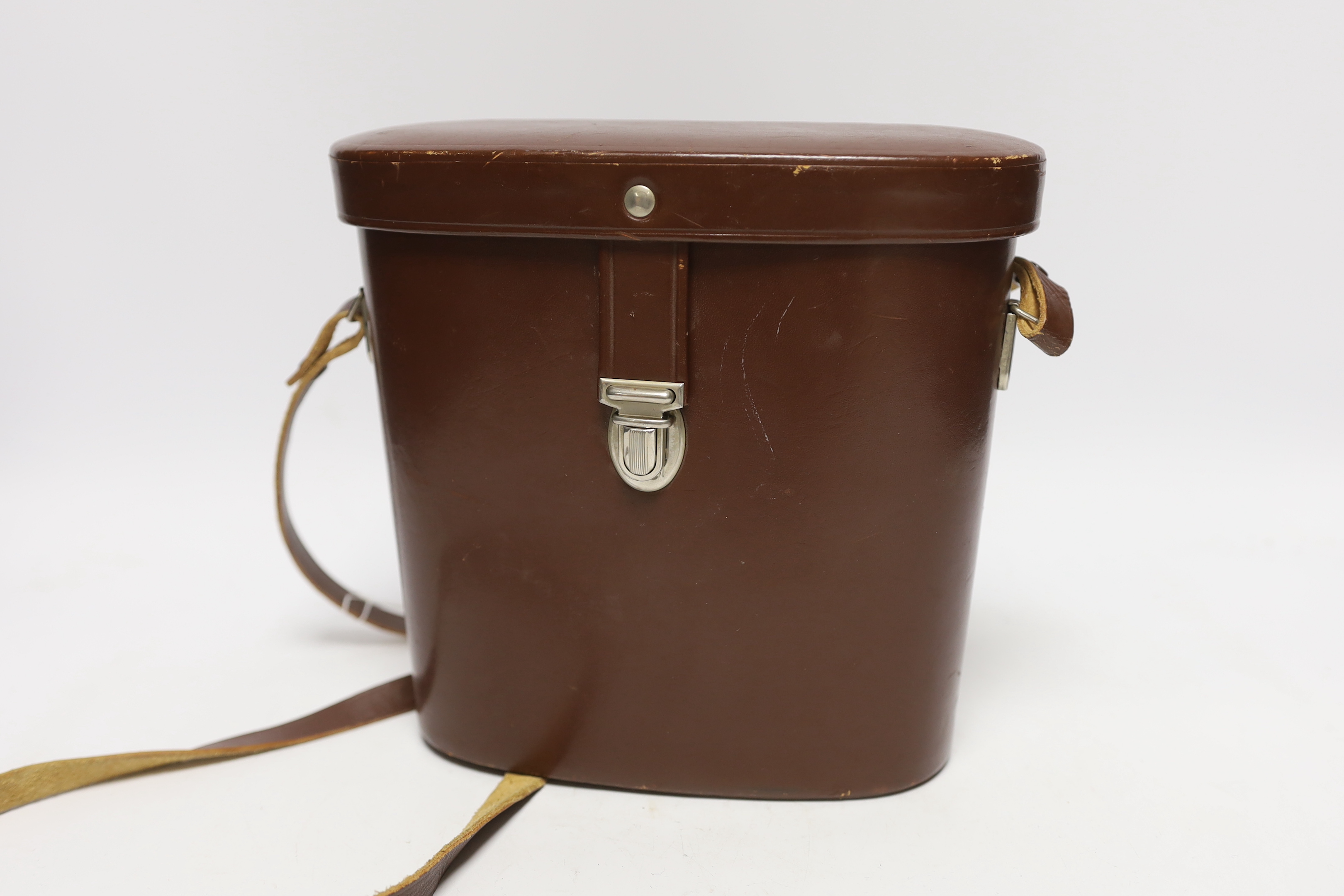 A pair of Zeiss Octarem 8X50B binoculars in a leather case with strap